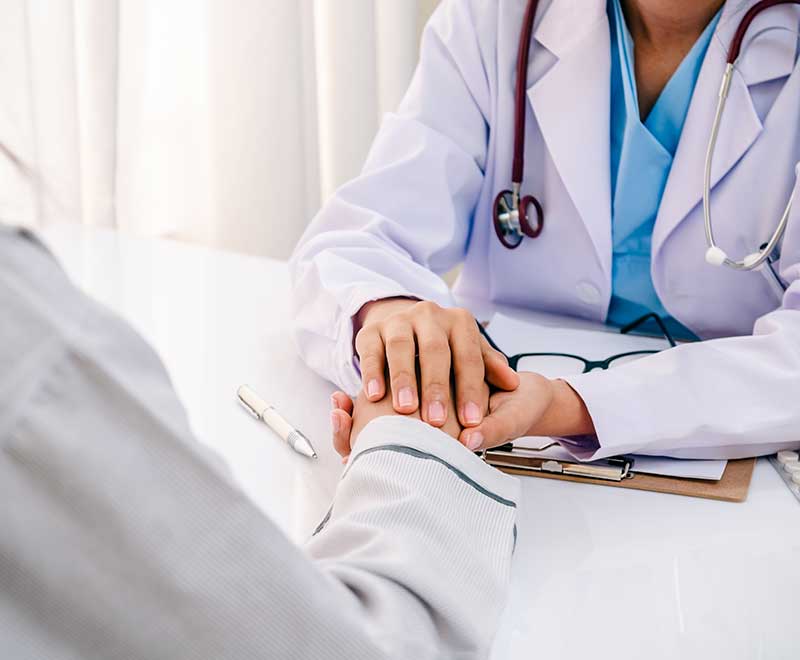 doctor comforting patient