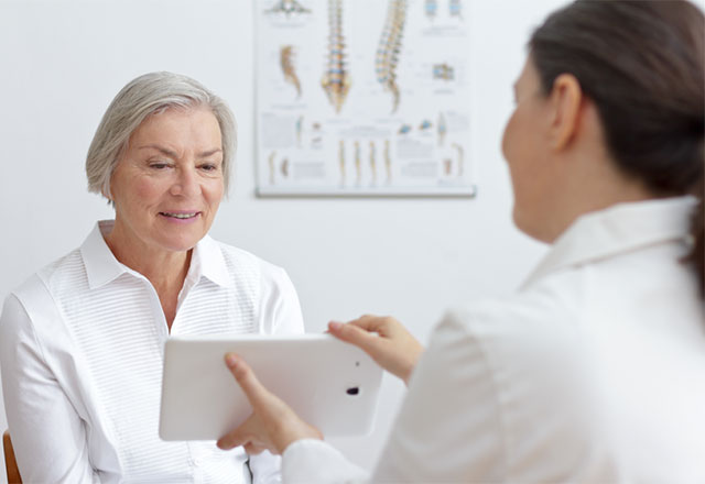 A patient discussing things with their doctor.