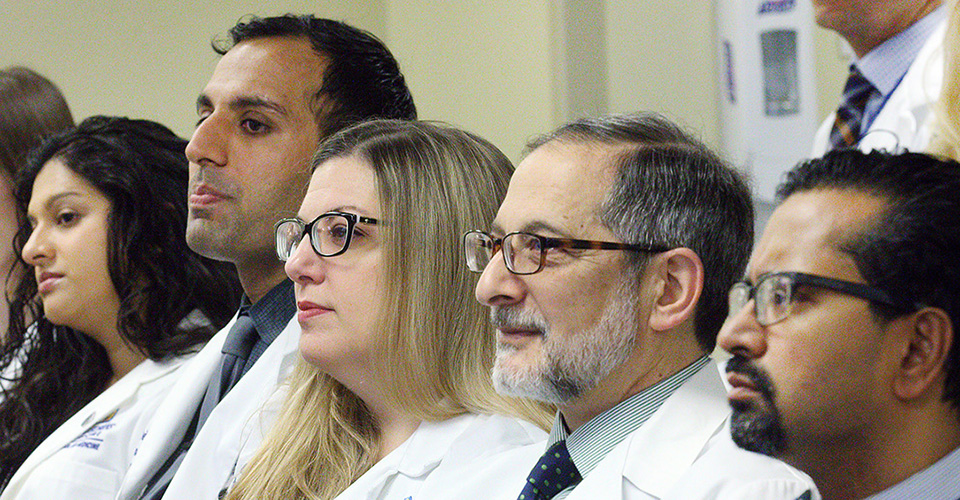physicians listening to a presentation