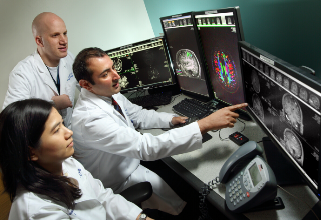 neuroradiologists in reading room