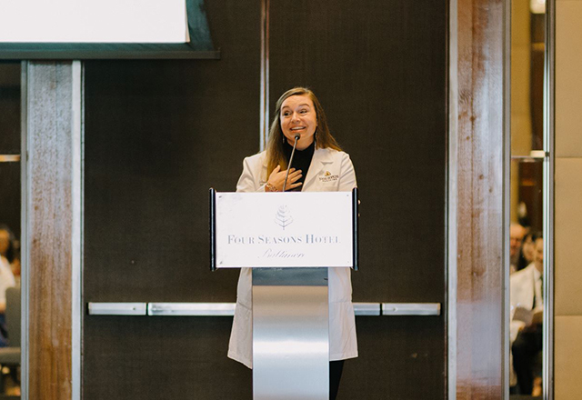 Dr. Erin Gomez, director of the Diagnostic Radiology residency program, also took time to speak to the graduates before presenting them with certificates.