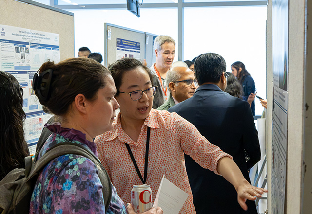 Researchers shared posters highlighting their recent work.
