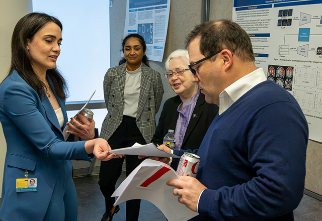 During lunch, attendees had the chance to review research posters.