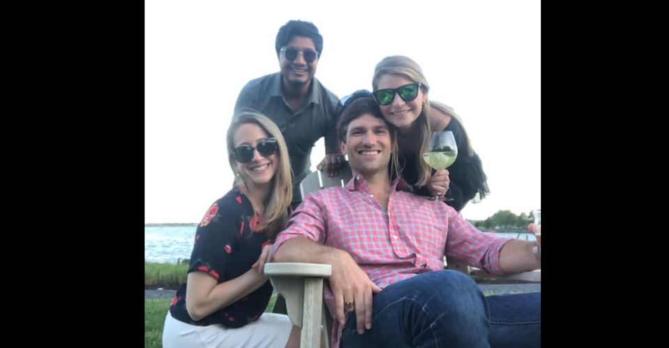 residents posing on the waterfront