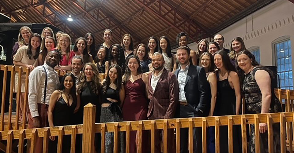 Pediatric residents standing on a balcony