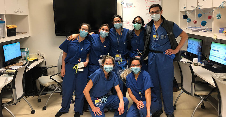 Pediatric residents in scrubs