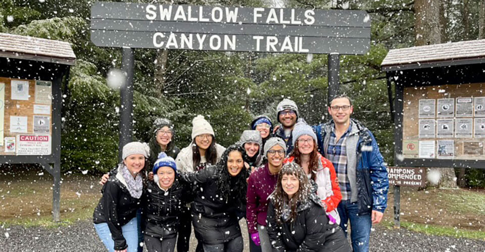 Pediatric residents standing outside Swallow Falls Canyon Trail
