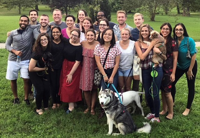 resident group photo with dogs