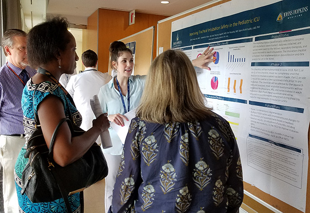 Resident presents her research during Scholarly Achievement Day