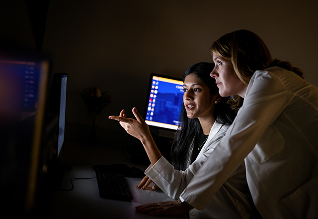 doctors looking at screen