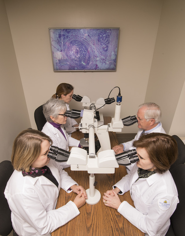 Pathology Team Viewing Slides