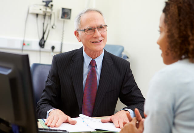 Primary Care doctor talking with his patient