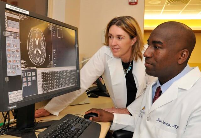 Stroke Center Doctors Reviewing Scan