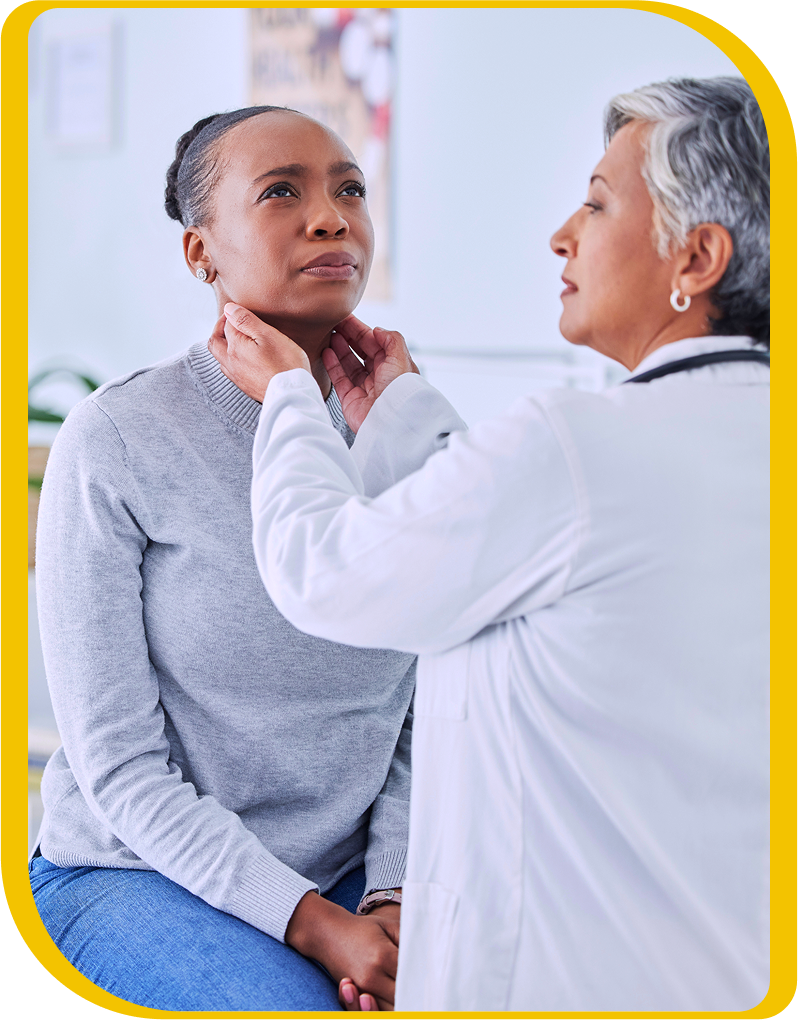 Doctor checking a woman's neck