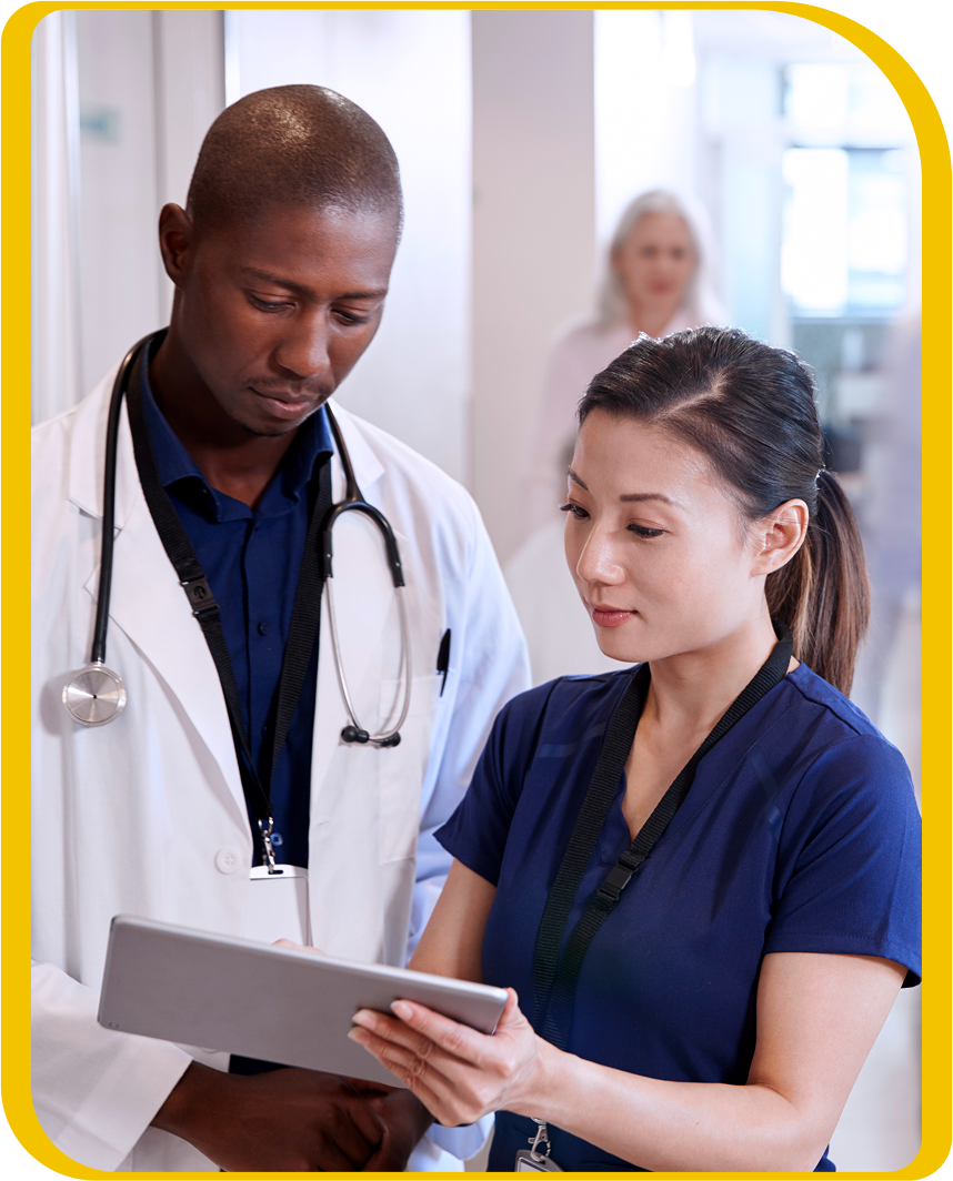 Health professionals checking a medical chart