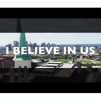 Screengrab of video that reads I BELIEVE IN US.