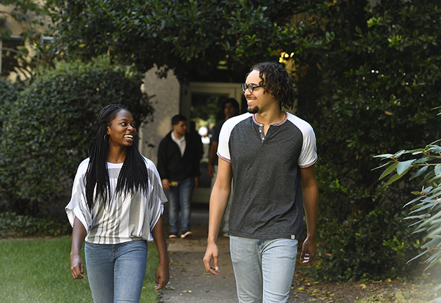 students walking in a courtyard