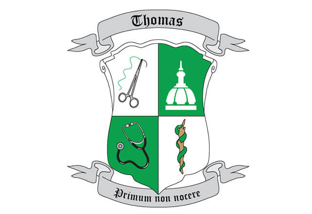 Thomas College Crest