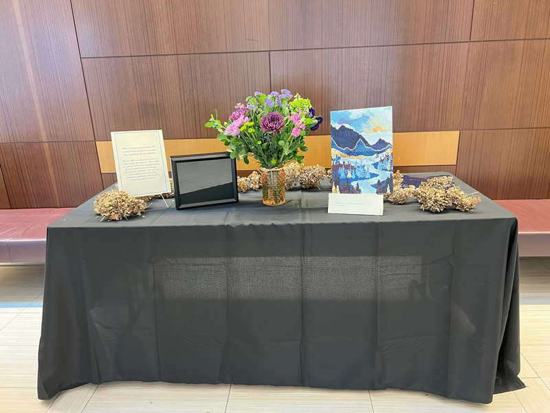 Decorated table with black tablecloth for the Anatomy Memorial