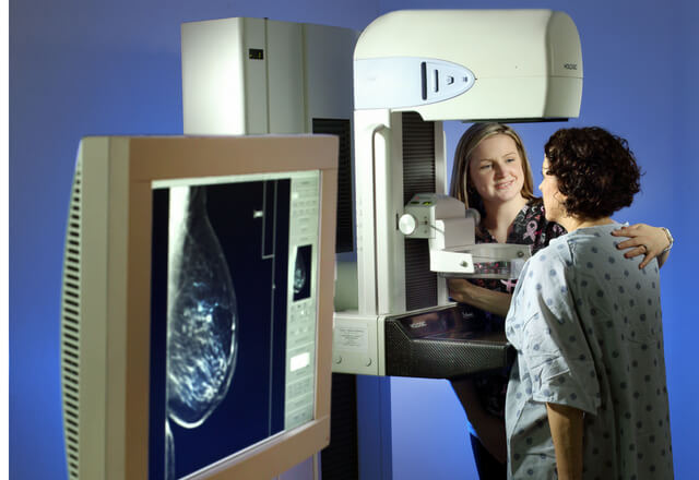 woman getting a mammogram
