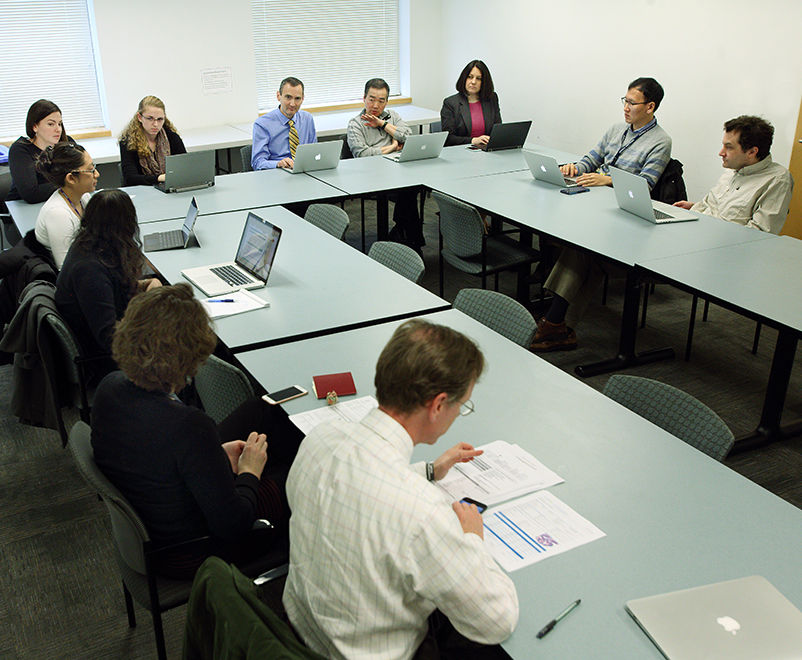Tumor board meeting with medical experts
