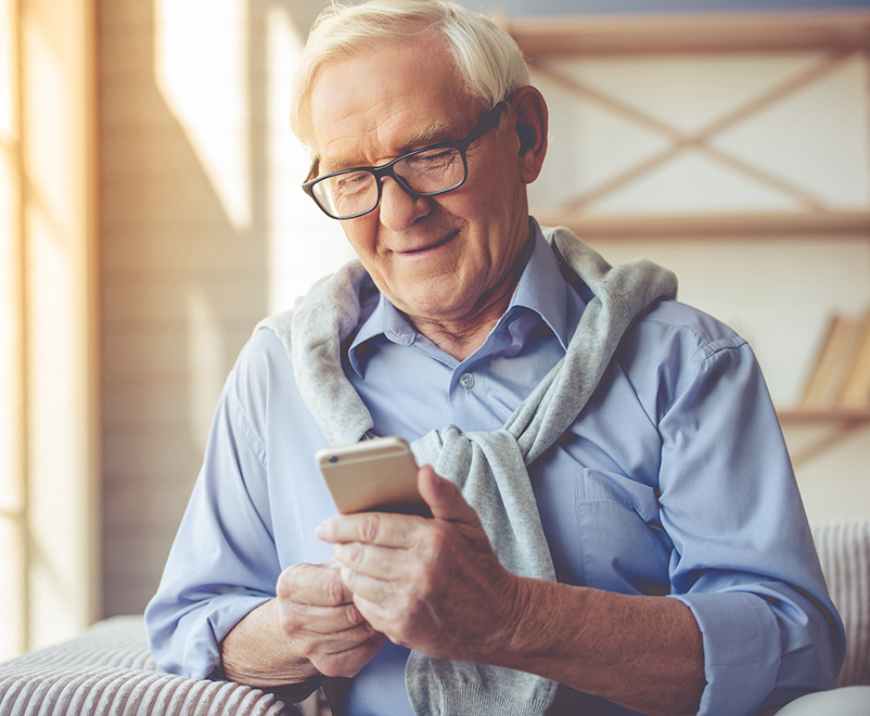 mature man using cellphone
