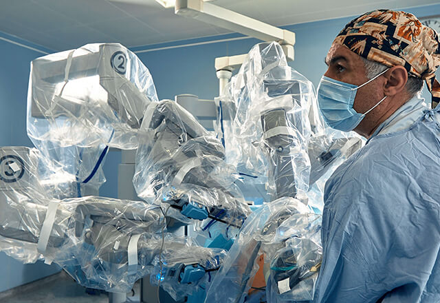 A photo of an operation involving a robot.