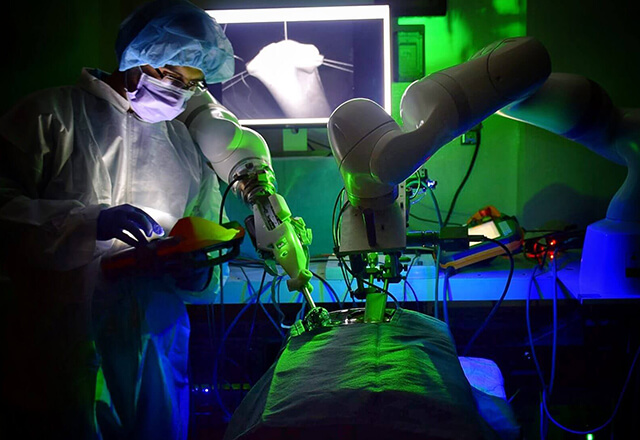 A photo of a procedure involving the Smart Tissue Autonomous Robot (STAR) system.