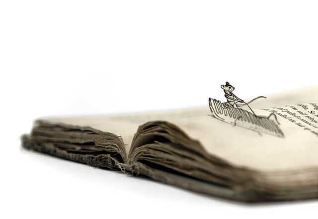 Artwork show a book with the character Stuart Little popping up from the pages.