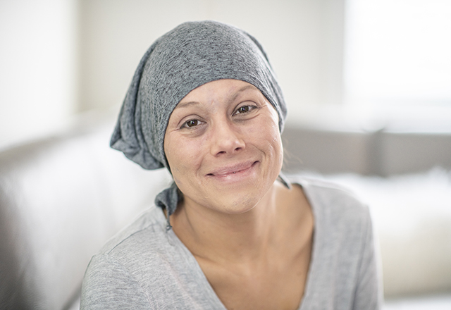 woman wearing scarf smiling