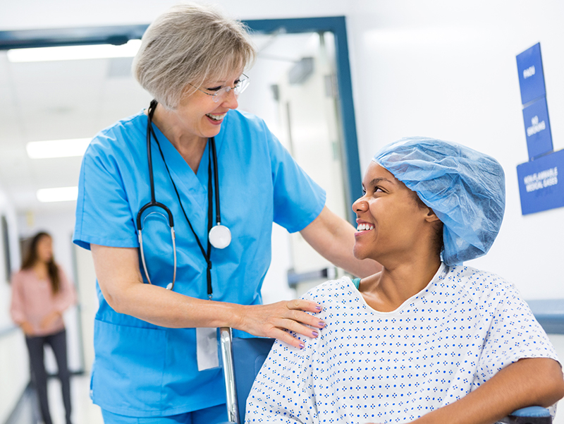 nurse with patient in wheelchair