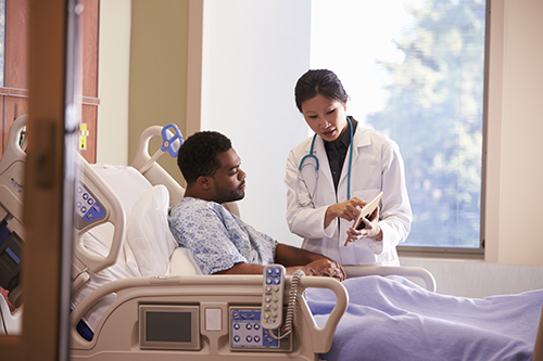 doctor talking to patient