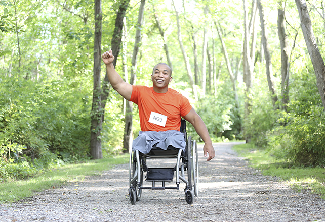 penis transplant - man in wheelchair park marathon