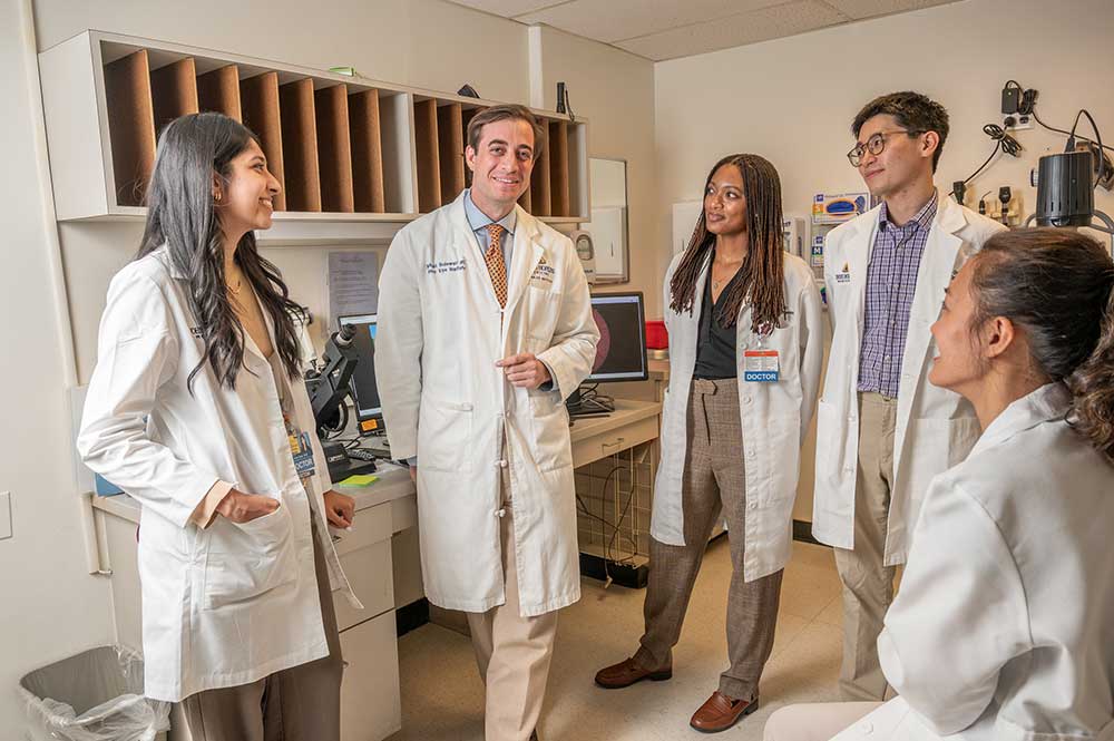 Michael Sulewski with residents Yesha Shah, Khala Webb, Nathan Pan-Doh and Maggie Hsu