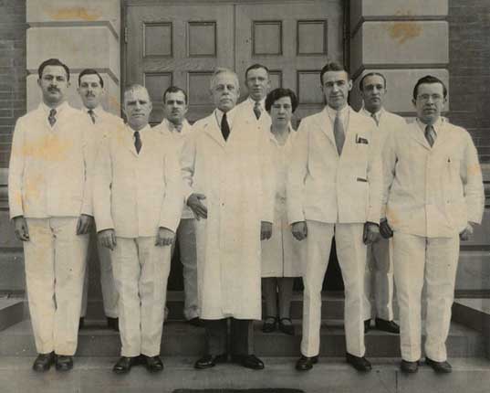 Black and white photo of several medical trainees standing together