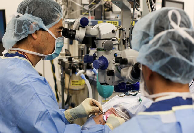 Wilmer retina surgeon observes patient