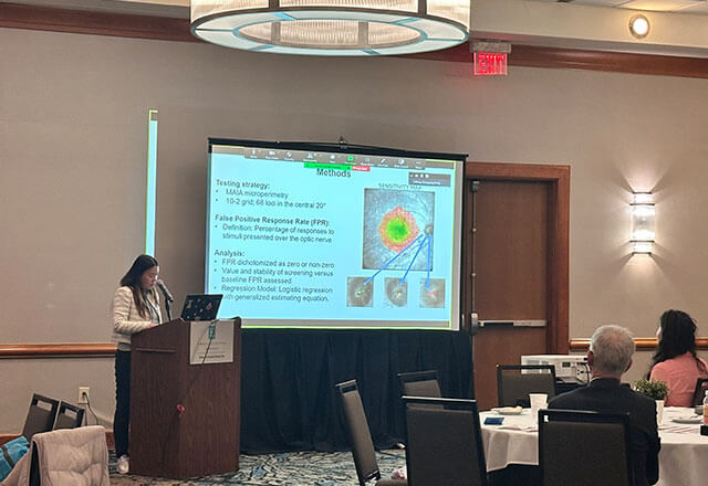 Izzie Wang presenting research. 