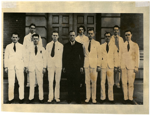 Group of doctors. Betty Constantine is the only woman in the photo, situated in the back row.