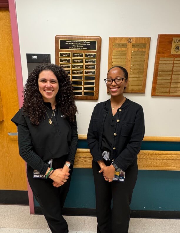 Drs. Houssan and Girum candid photo in clinic.