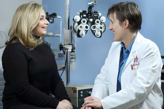 Dr. Jennifer Thorne consulting with patient