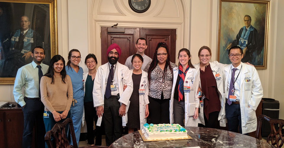 Wilmer residents celebrating a birthday in the Portrait Room