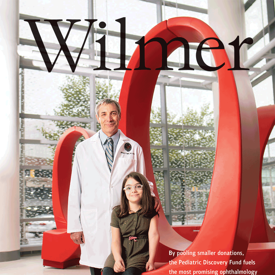 Annual report 2018 cover showing Michael Repka in a white coat with a pediatric patient