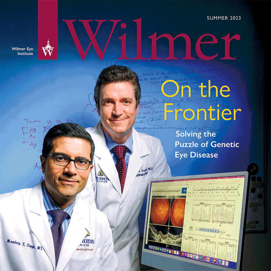 Wilmer summer 2023 cover with two physicians standing near a research scan. The headline reads On the Frontier.