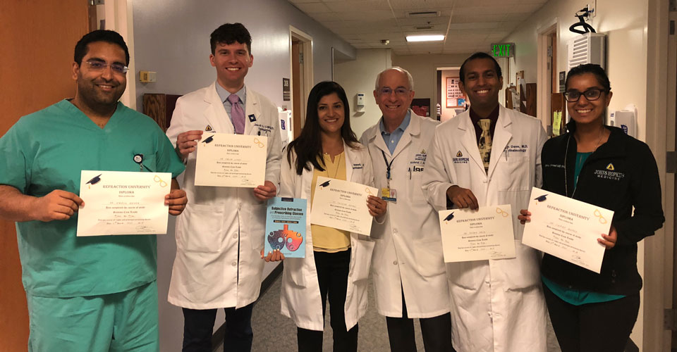 Wilmer residents hold up Refraction university certificates