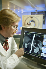 Dr. Elliot Fishman examining a CT scan for evidence of cancer