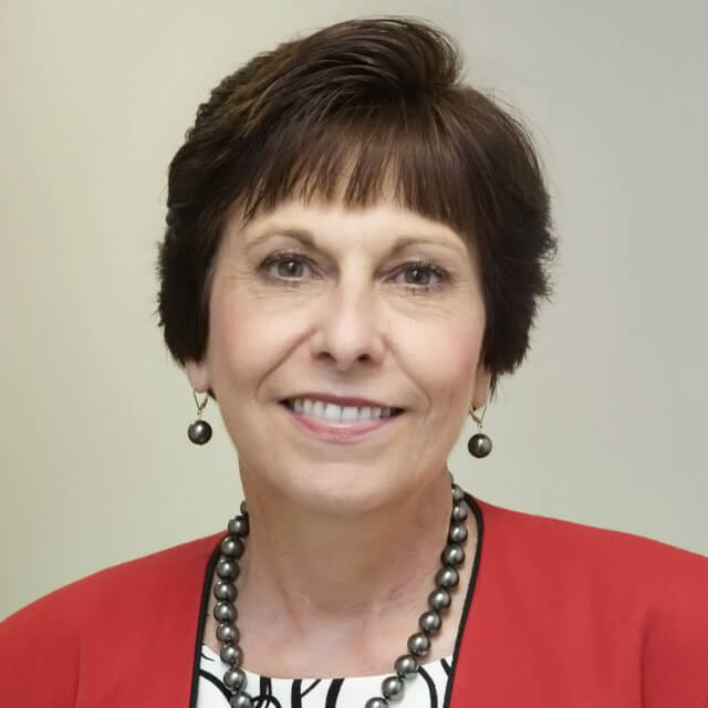 A photo shows Judy Brown.