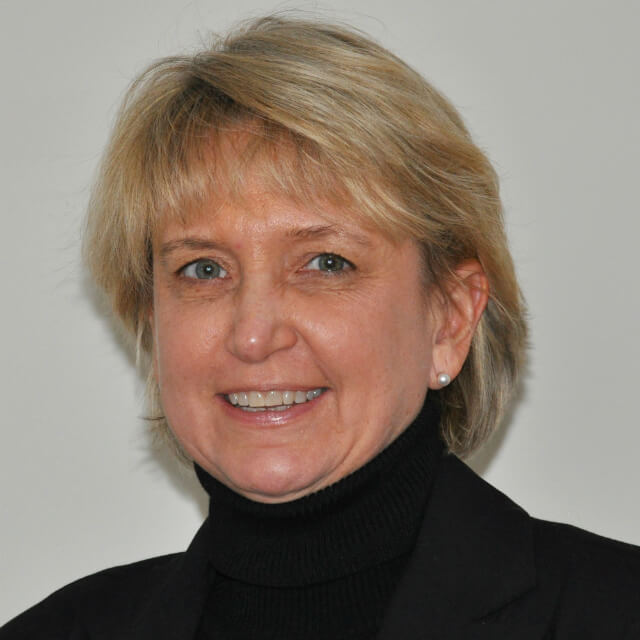 The photo shows Lisa de Gouchy.