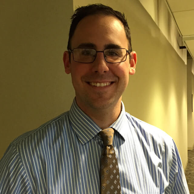 A photo shows Jason Conti.