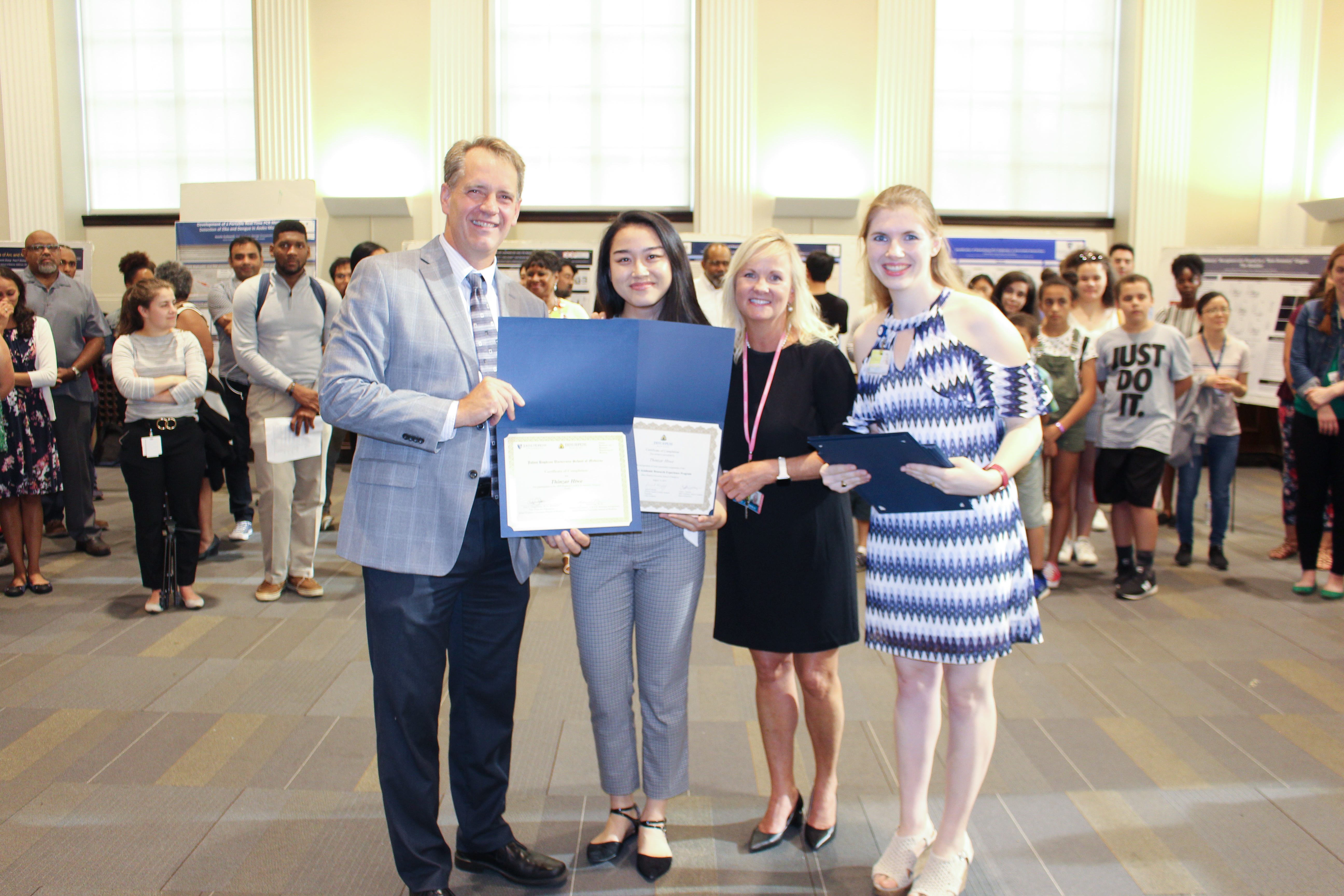 Thinzar at 2019 SARE poster session