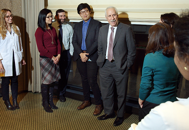 Rothman stands with medical students